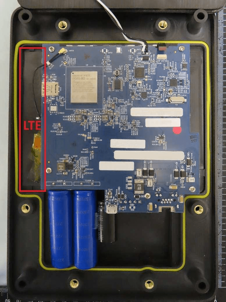 Shielded LTE modem, dual antennas, and modular battery power on high-density PCB.