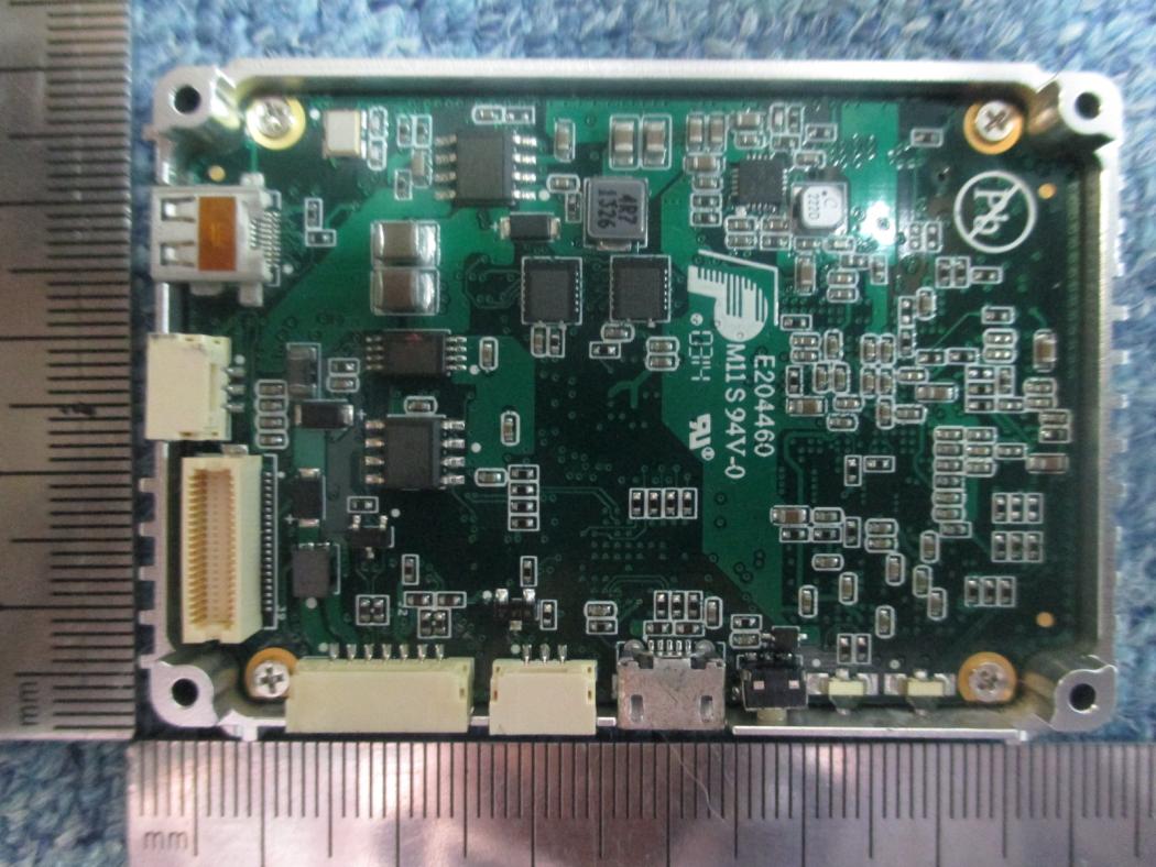 PCB with microcontroller, connectors, and power management components.