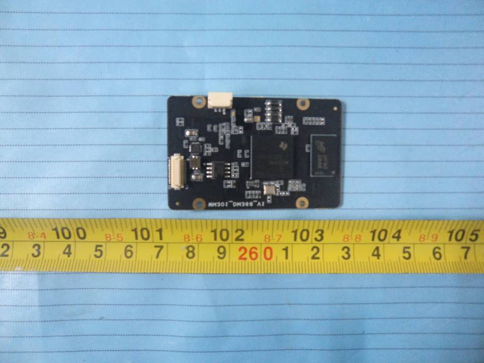Compact PCB with central processing IC.