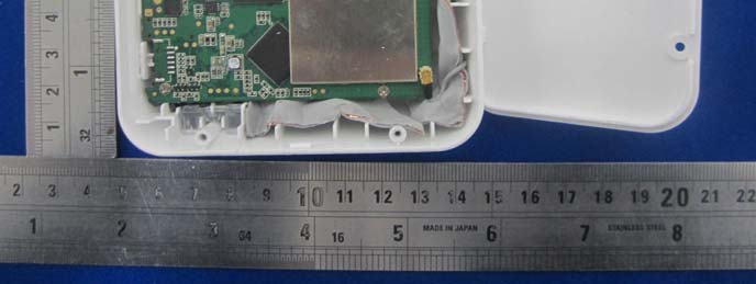 PCB with RF Shielding and Power Components.