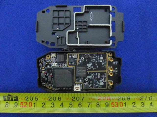 PCB with SoC, RF connectors, and comprehensive EMI shielding.