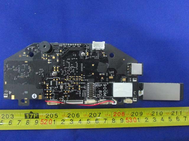 RF module PCB with dual-band antenna structures and shielding.