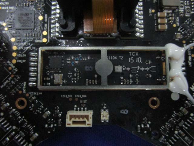 High-density PCB with MCU, RF shielding, and advanced routing.