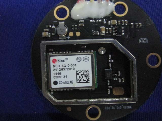Compact GPS module featuring u-blox chipset and crystal oscillator.