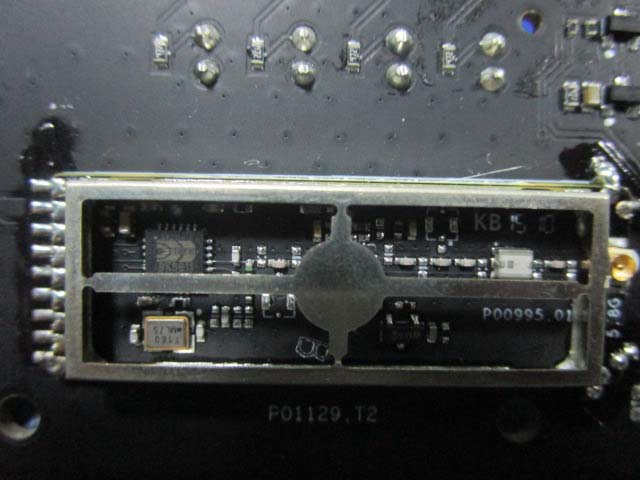 Shielded RF section with crystal oscillator for precise wireless communication.