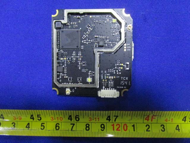Main board with processor, shielding, and USB/power interface.