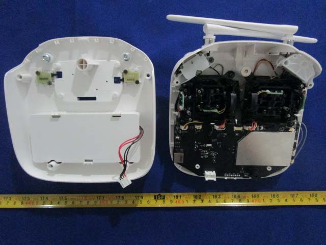 Remote controller PCB with RF shielding and dual external antennas.