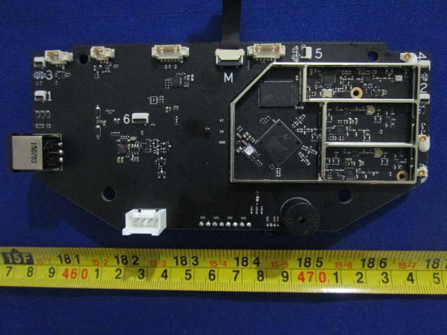 Main RF/processor board with shielded ICs and modular connectors.