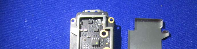 Main PCB: Dense SoC, RF shielding, and power regulation components.