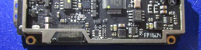 Close-up: Custom RF ICs and dense, multi-layer PCB layout.
