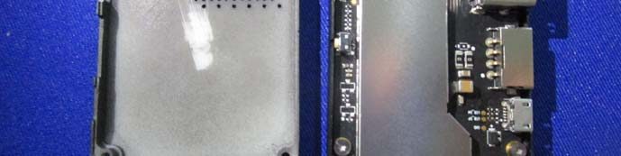 PCB with USB-C, dense components, and removed RF shield.