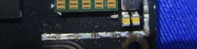 PCB close-up with controlled impedance traces and test point array.