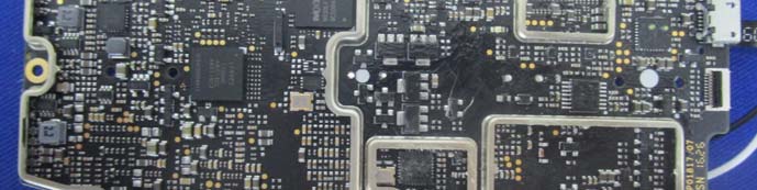 PCB with SoC, memory, and extensive EMI shielding for RF integrity.