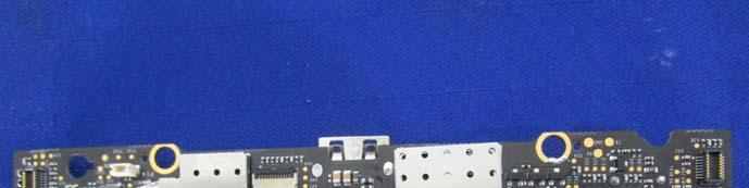 High-density PCB with modular connectors and multiple shielded RF sections.