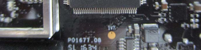 Shielded PCB with main processor and power management components.