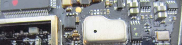 RF-shielded PCB area with power management and high-speed connector.