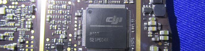 Main PCB with custom DJI SoC and dense power management components.