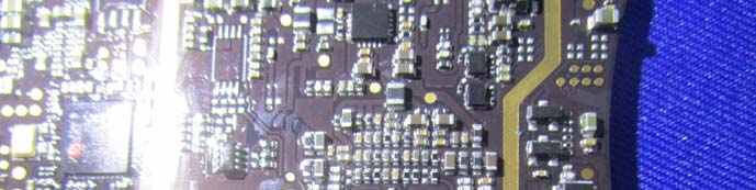Dense PCB with analog front-end and power management ICs.