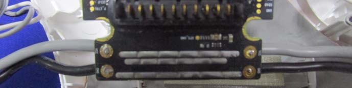 Power distribution board with gold-plated connector and thick traces.