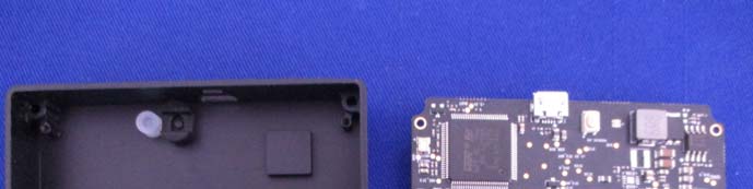 Main PCB with quad-flat processor, micro-USB, and power management.