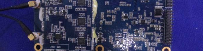 PCB assembly featuring RF coaxial connectors and integrated clock sources.