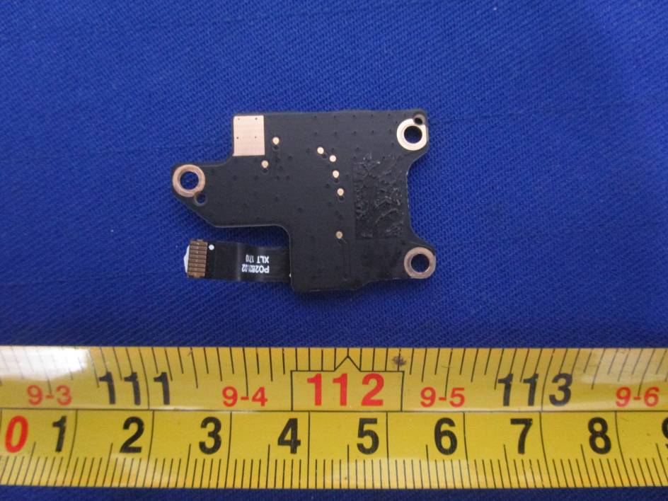 Compact PCB with flex cable—likely antenna interface.