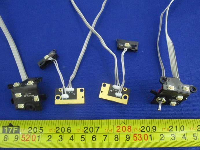 Switch assemblies for customizable control buttons and levers.