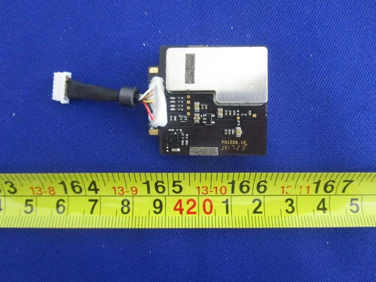 Main RF/digital PCB with EMI shielding and power regulation.