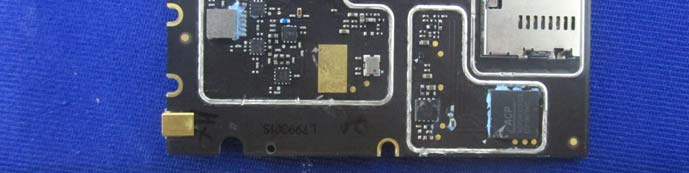 Black ENIG PCB with shielded zones, crystal oscillator, and microSD slot for RF integrity.