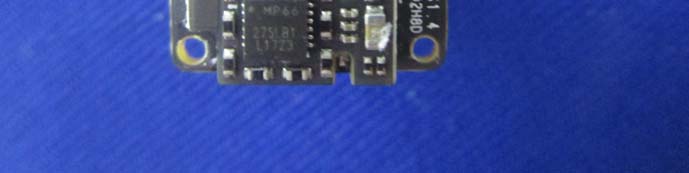 Compact precision submodule PCB with key IC and passive components.