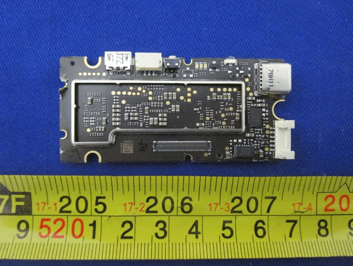 Main PCB with RF shielding and multi-connector layout for communication/navigation.