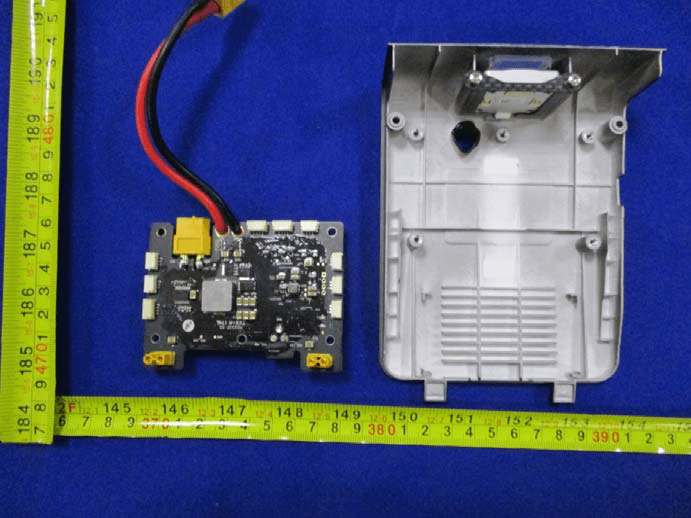 Main power/control PCB with central IC, XT60 connector, and high-current paths.