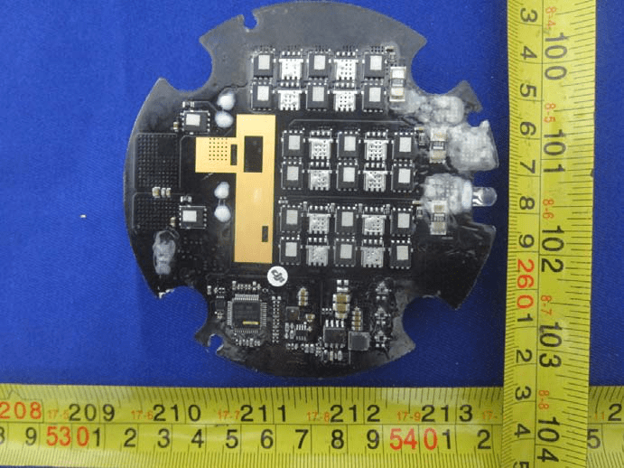 Circular multi-phase ESC PCB with dense MOSFET array and robust power routing.