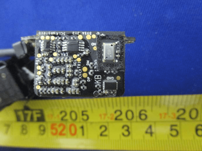 Compact sensor module PCB with MEMS sensor and labeled signal interfaces.