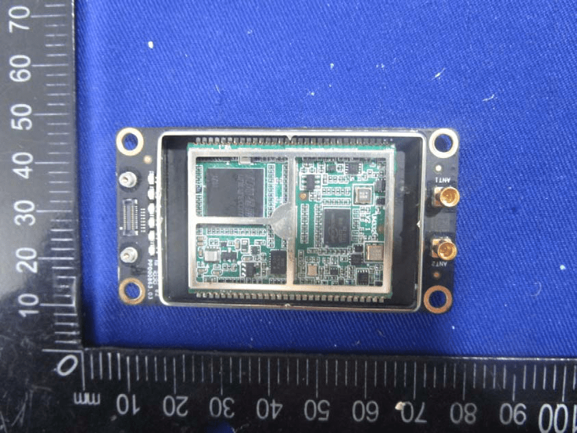 Dual-antenna RF module: shielded transceivers and high-density PCB layout.
