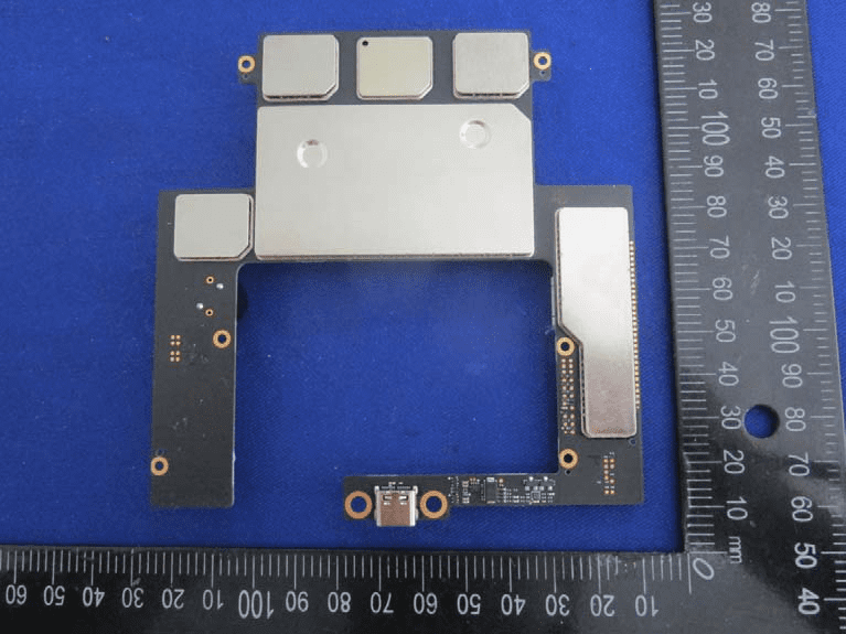 PCB assembly with USB-C, extensive shielding, and test points.