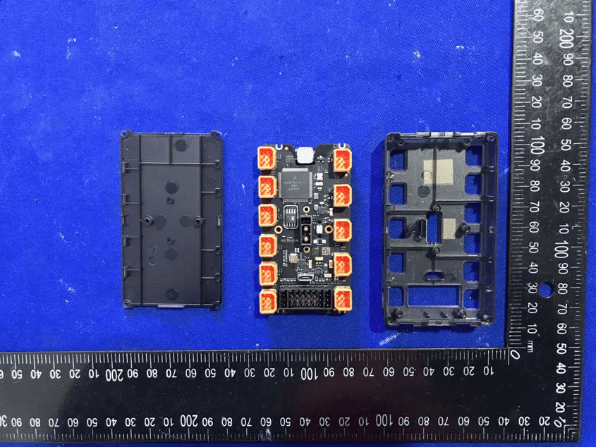 Main control board with central MCU and power management components.