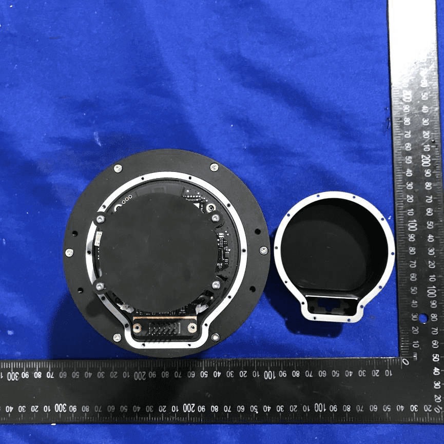 Circular high-density PCB with central EMI/RFI shield and robust connector.
