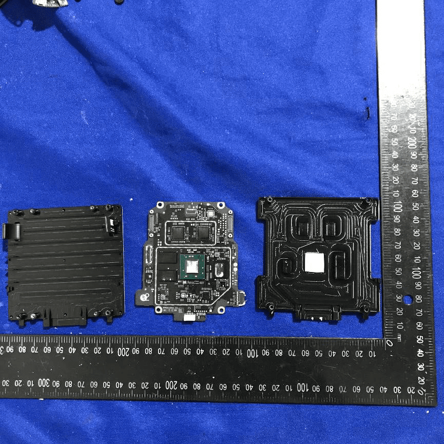 Main PCB with SoC, high-speed memory, shielding, and thermal management.