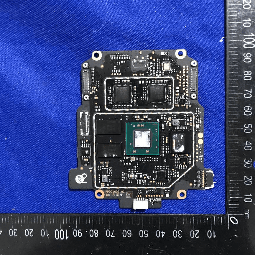 Processing board with central SoC, memory, and modular connectors.