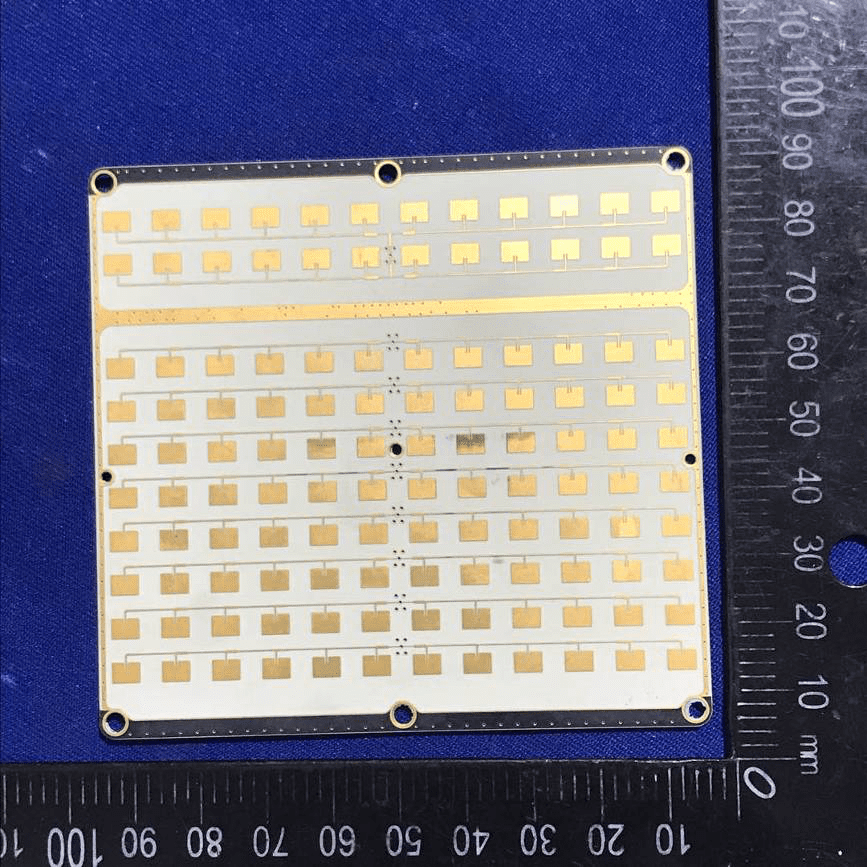 Gold-plated patch antenna array for high-frequency beamforming.