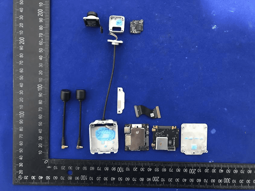 Major PCBs, RF shields, and antennas—full teardown layout.