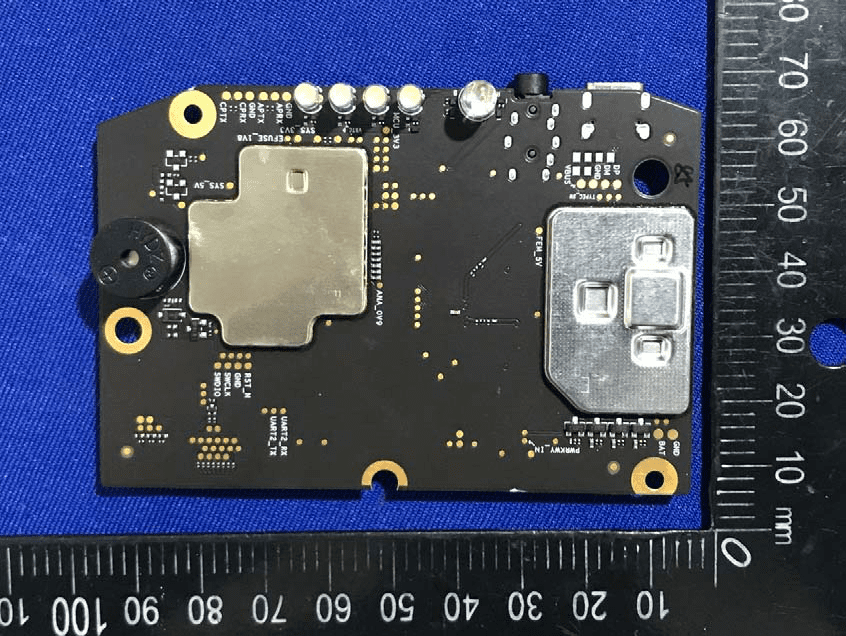RF section PCB with dual EMI shields and high-density layout.