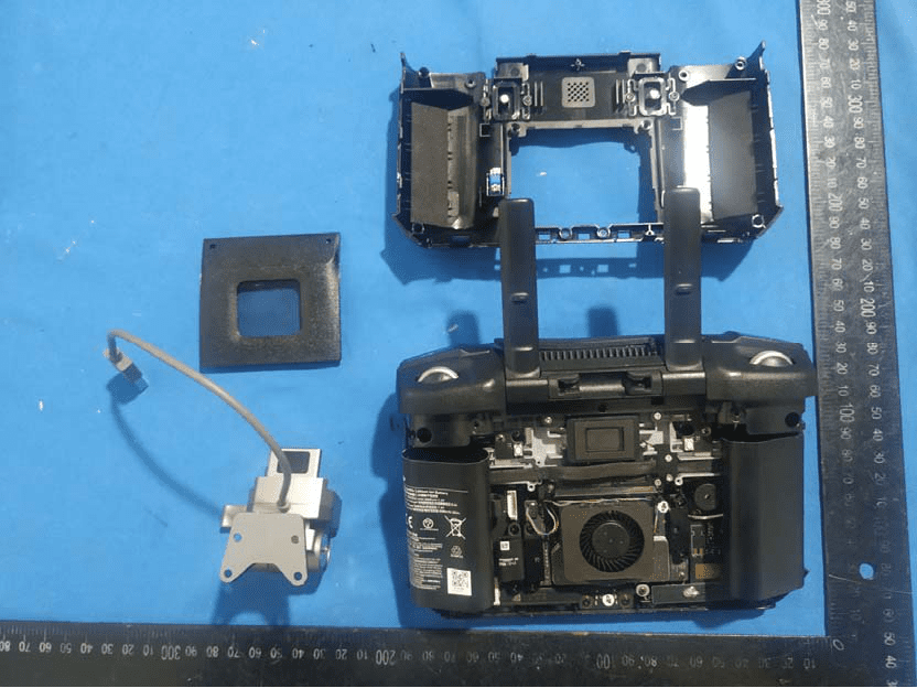 Controller main PCB with processor, cooling, and external antenna connections.