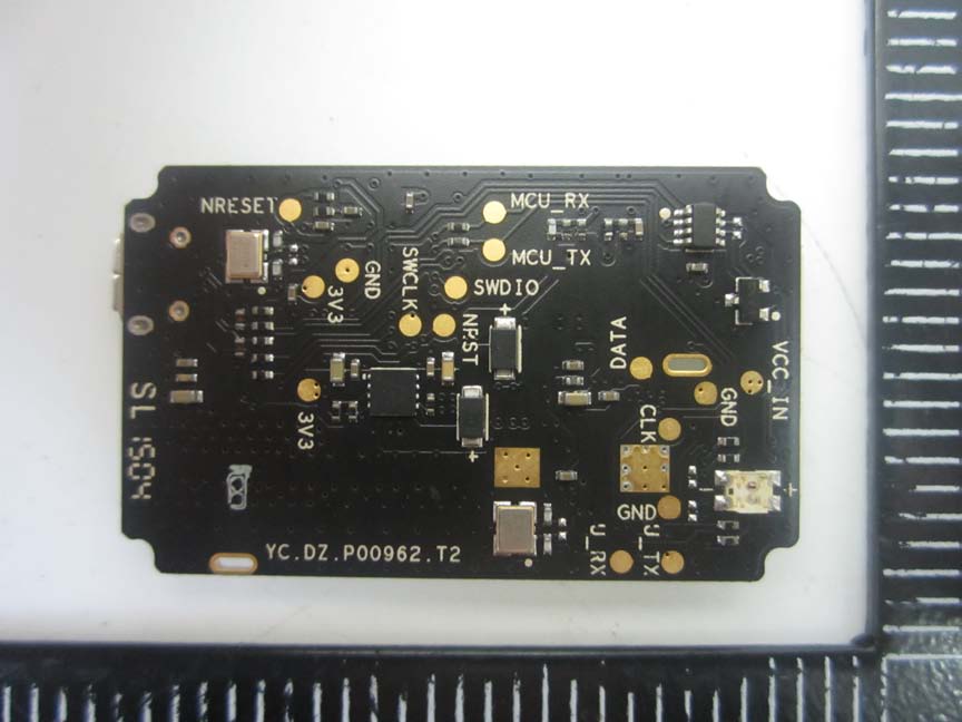 Interface PCB with debugging and communication pads.