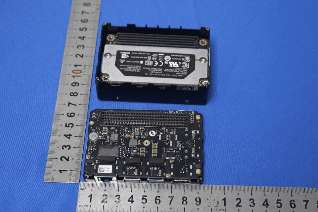 Main PCB with high-density connector, SoC, and robust power components.