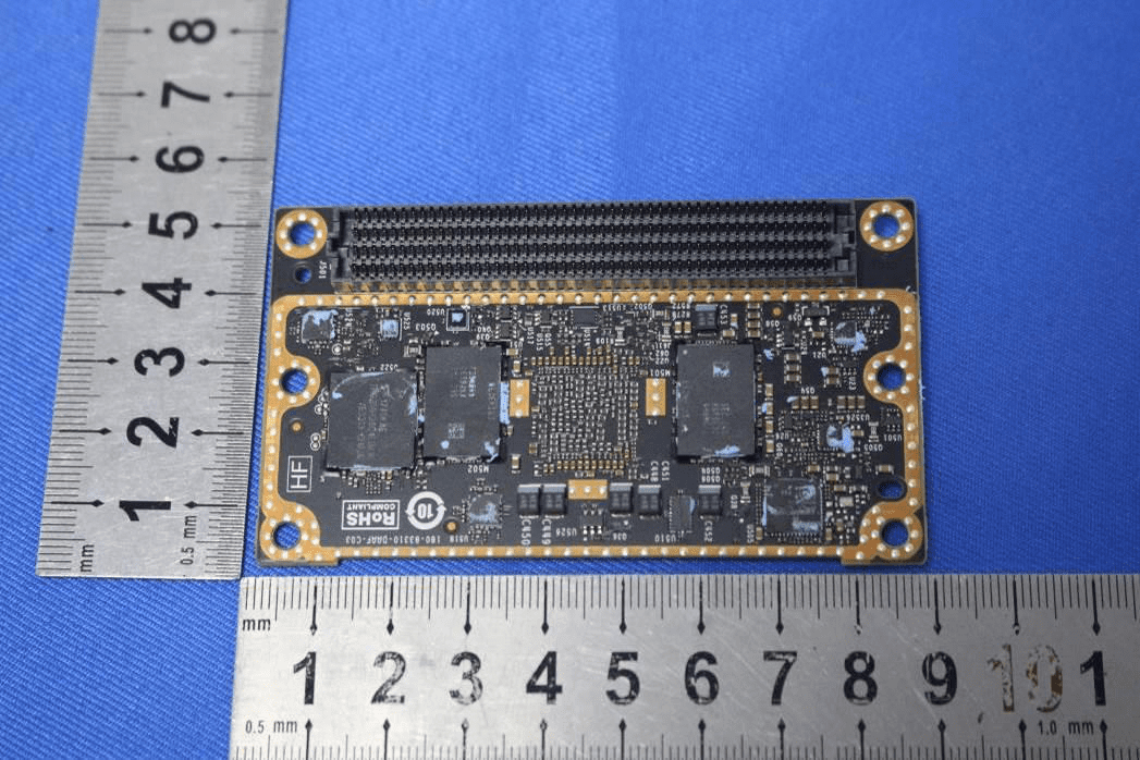 Densely packed PCB with SoC, memory, and modular high-speed connector.
