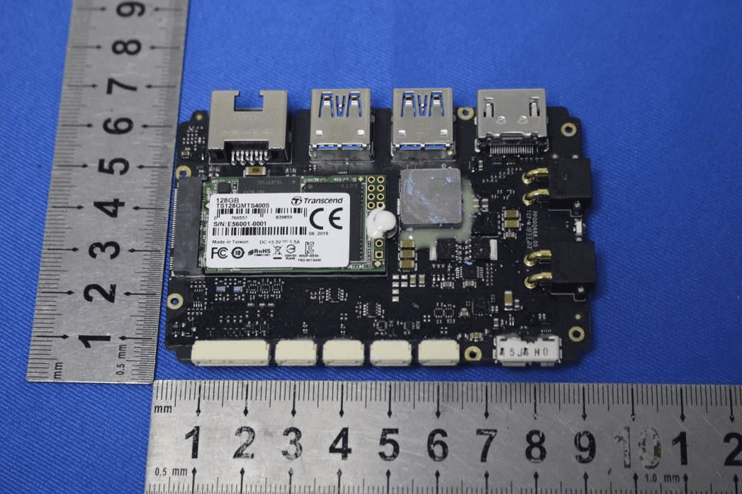 PCB with removable M.2 SSD, SoC heat spreader, and rich I/O connectors.