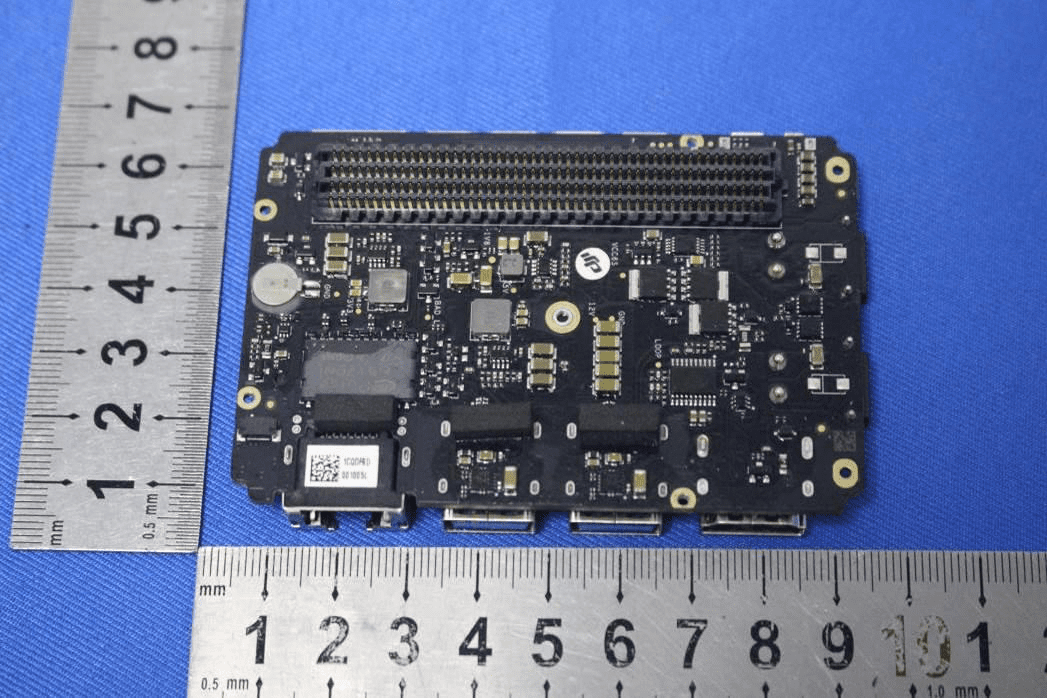 Multi-layer PCB with SoC, memory, and modular stacking connectors.