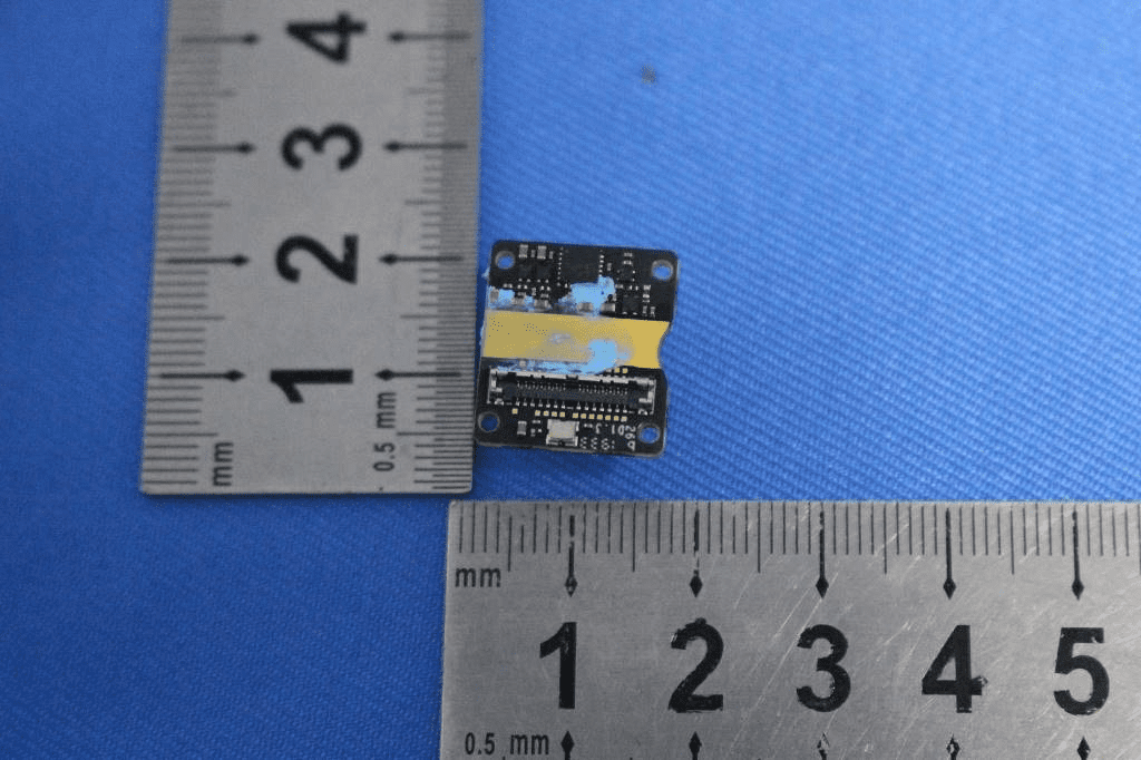 Compact sensor module PCB, likely IMU, for precise flight stabilization.